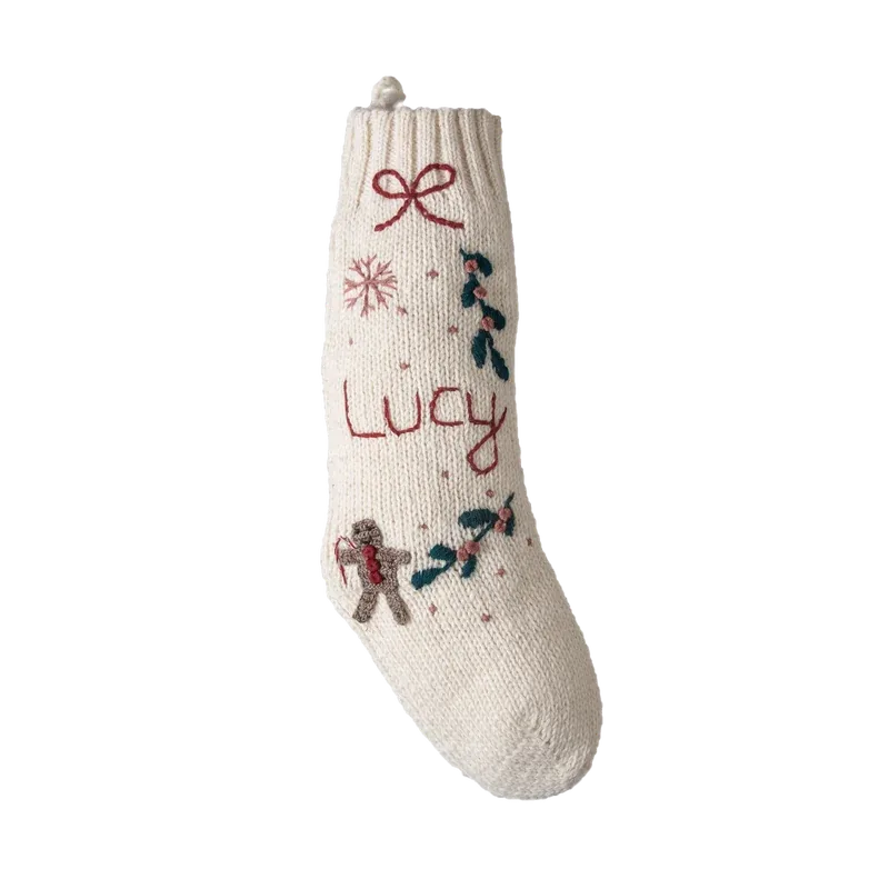 Ivory personalized knit Christmas stocking with bow gingerbread and winter motifs