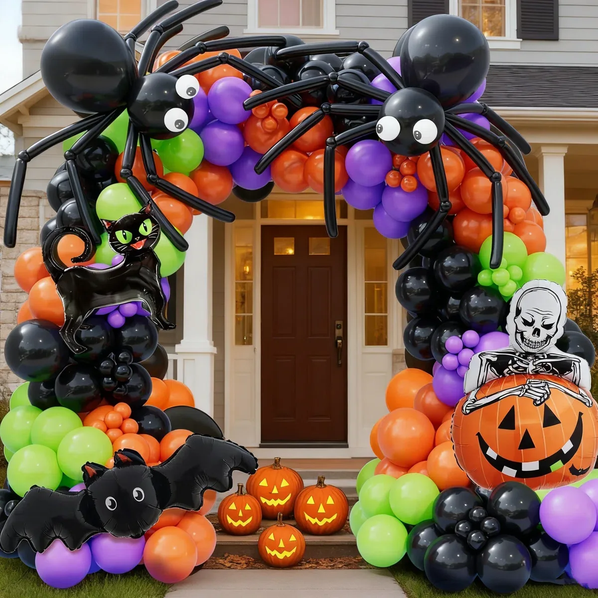 Halloween balloon arch with spiders, pumpkins, a cat, a bat and a skeleton at a front entrance
