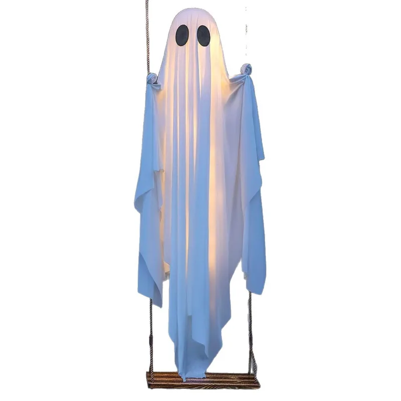 White ghost figure hanging above a wooden swing on a plain background