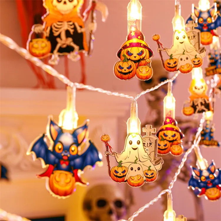 Illuminated Halloween character string lights in a seasonal display