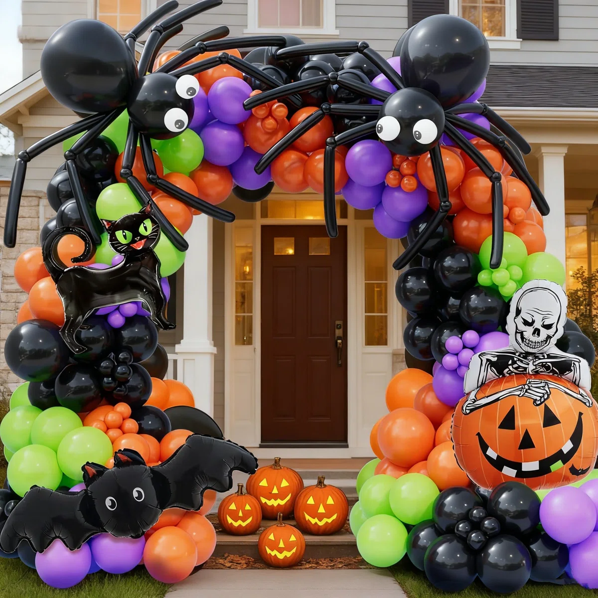 Halloween balloon arch with spiders, pumpkins, a cat, a bat and a skeleton at a front entrance